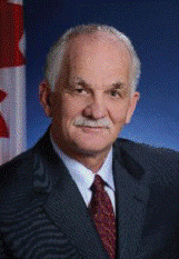 L'honorable Vic Toews, c.p., c.r., député Président du Conseil du Trésor