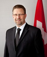 The Honourable Chuck Strahl, P.C., M.P., Minister of Transport, Infrastructure and Communities