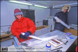 Scientists from the Geological Survey of Canada cutting ice samples from Mount Logan